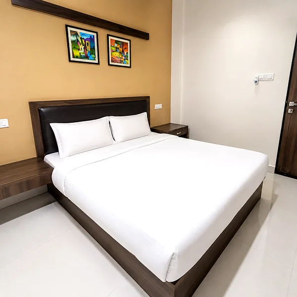 Clean and prepared guest room at Toran Ambika